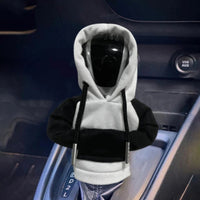 Hoodie Noir et Blanc pour levier de vitesse, avec capuche et cordons, offrant une touche personnalisée à l’intérieur du véhicule.